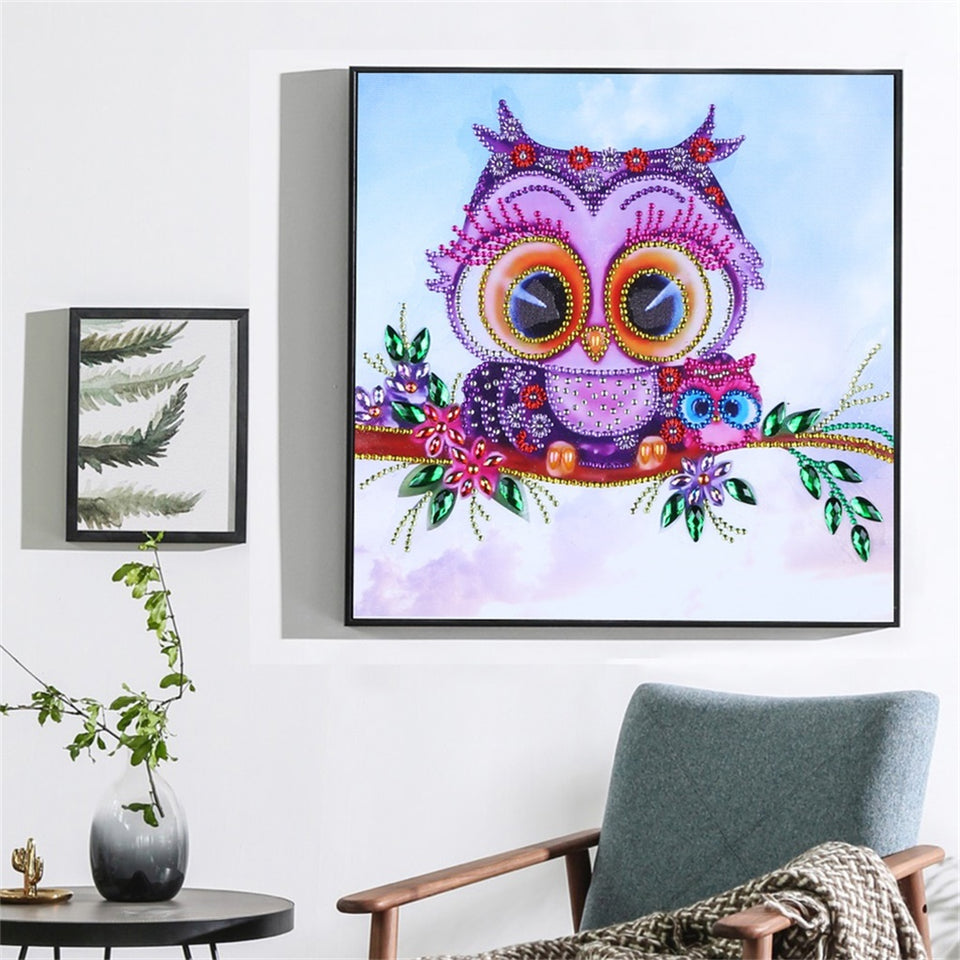 Cute Small Owl On Tree