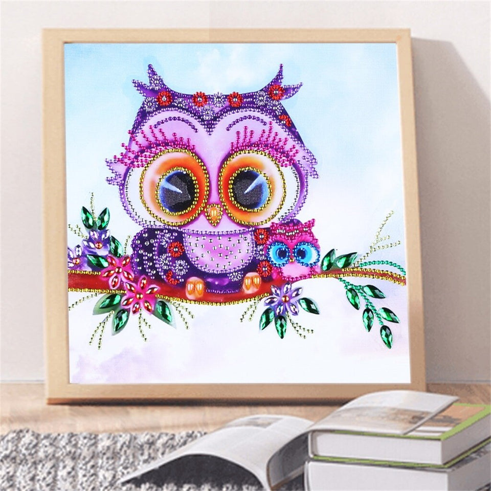 Cute Small Owl On Tree