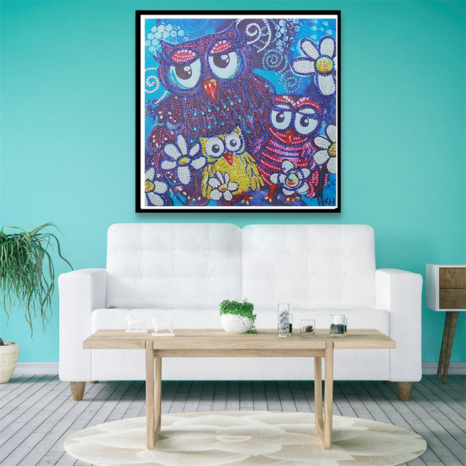 Three Cute Owls With Flowers
