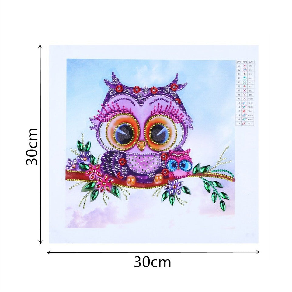 Cute Small Owl On Tree