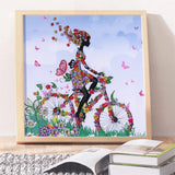 Girl On Bike With Butterfly