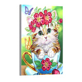 Cute Cat With Flowers In Cup
