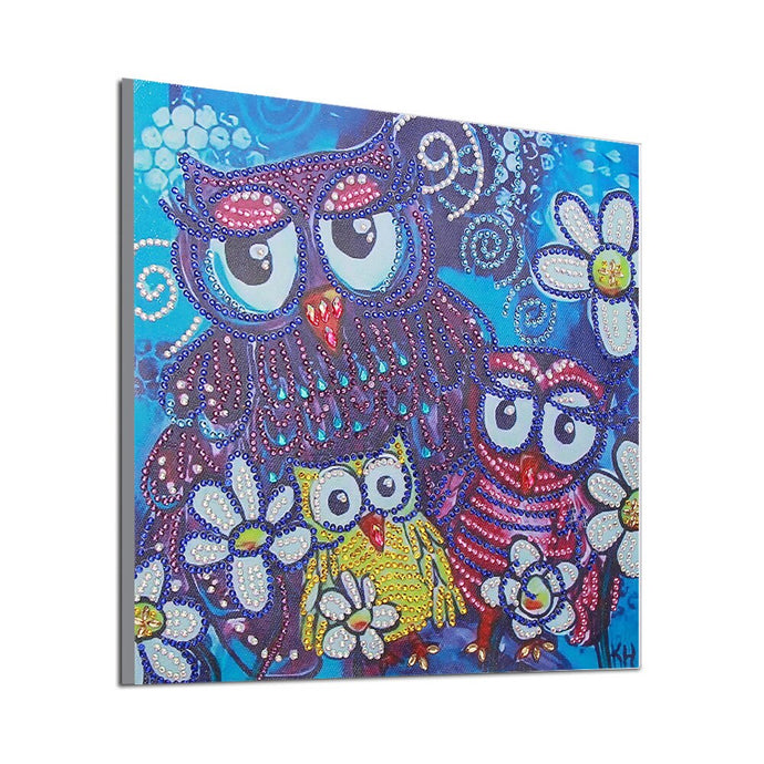 Three Cute Owls With Flowers